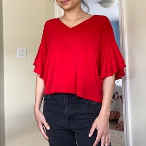 Bright red short ruffle sleeve Express top.